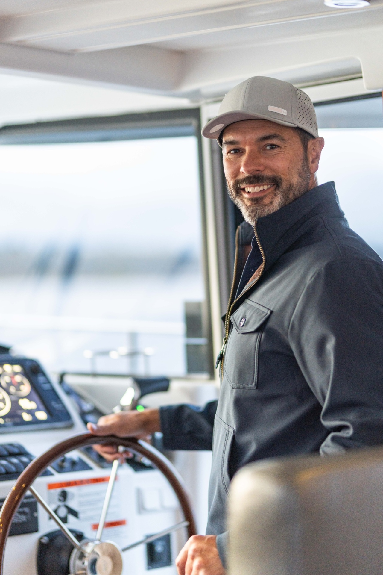 Captain Jeff at the helm of his charter boat